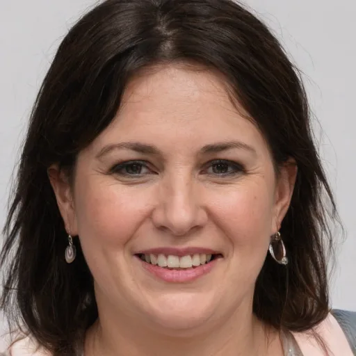 a woman in her 40s with shoulder-length dark brown hair, the photo they started with